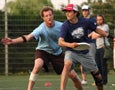 Adults Playing Frisbee