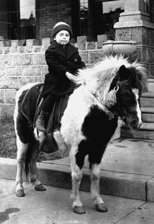 Isidore Gordon, the son of a kosher butcher, grew up in Newtown. One of his favorite hucksters in Newtown was a photographer who brought around a pony on which the children posed outside their homes. The children then asked their mother for a quarter to pay for the photograph. (Courtesy of Dr. Isadore Gordon)
