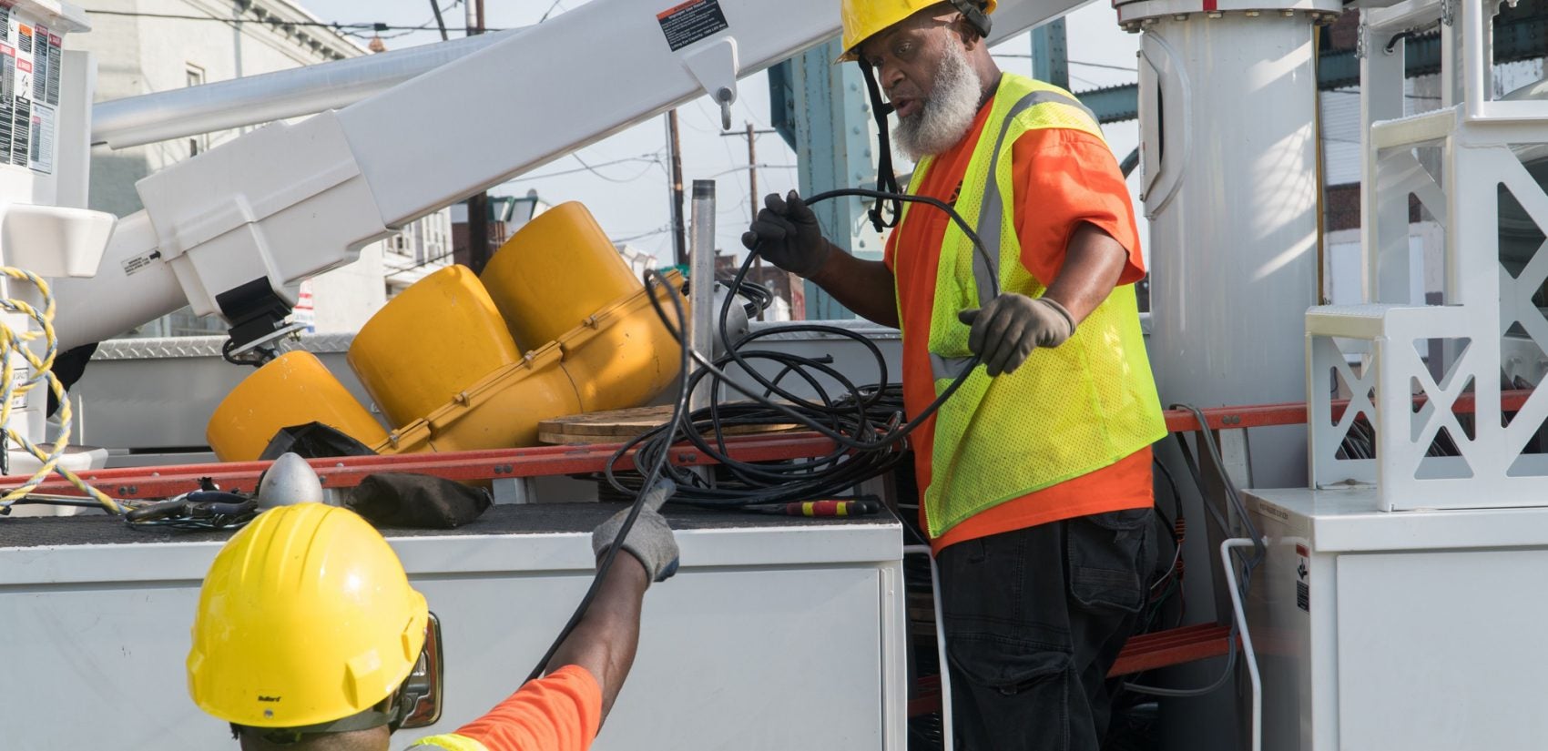 Joseph Kent works on a traffic-light repair. (Branden Eastwood for WHYY)