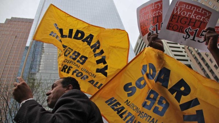 Protesters march through Center City demanding a $15 minimum wage.