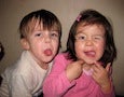 2 children making funny faces