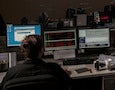 a woman sitting at a computer