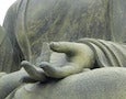 a statue of a meditating Buddha