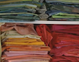 a shelf of colorful fabric