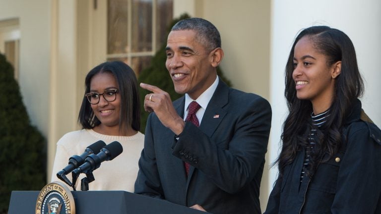 President Barack Obama with daughters Sasha (left) after Malia at his side, after 