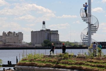 A 16-foot-high spiral staircase at the Washington Avenue Pier provides views up and down the Delaware River. (Emma Lee/WHYY)