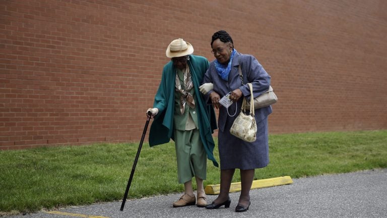  Gloria Jamison, right, escorts her mother, Isabella Jamison, who was born on Feb. 14, 1914, to Philadelphia's 15th Annual Centenarian Celebration at a union hall on Thursday, May 21, 2015, in Philadelphia. (AP Photo/Matt Slocum) 