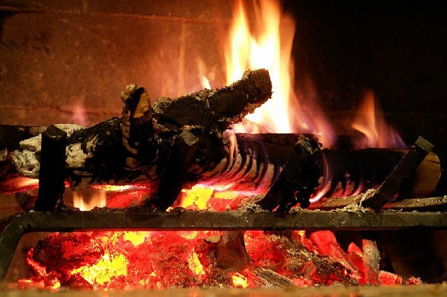  A warm, crackling fireplace in action. (Image: digitalshay via Flickr) 