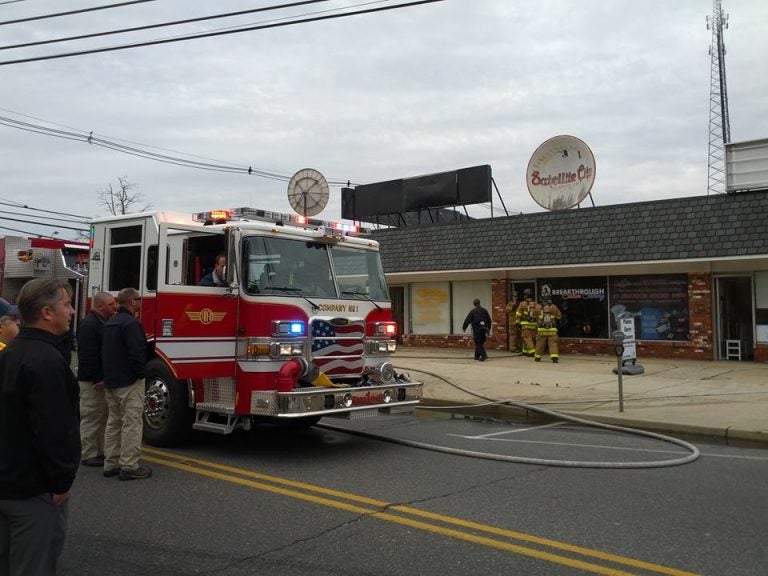  Firefighters entering a commercial structure on West Water Street in downtown Toms River late Thursday morning. (Photo courtesy of a Riverside Signal contributor) 