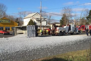  A dump truck overturned and spilled its load on Route 9 in Howell late Monday morning. (Photo: JSHN contributor Jo Hendley) 