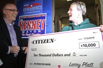 10k-voter-1-of-1-3 10th and Bigler crossing guard Bridget Conroy-Varnis irecieves 10K after voting.(Kimberly Paynter/WHYY)