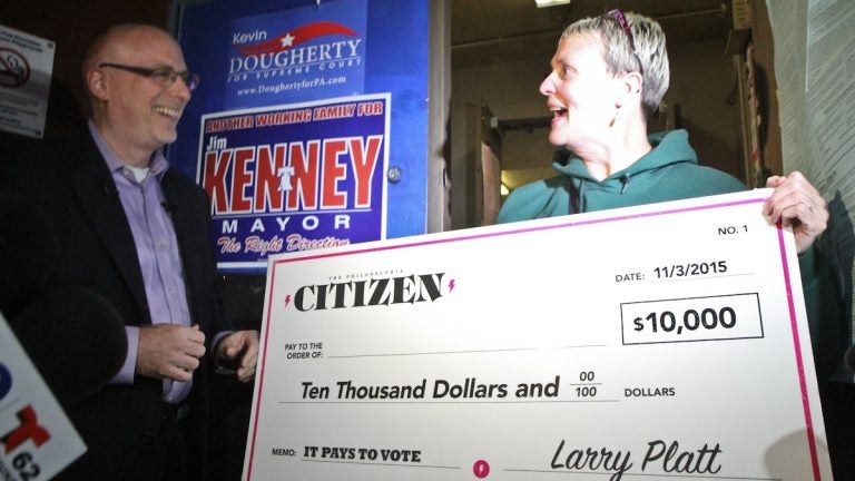 10th and Bigler crossing guard Bridget Conroy-Varnis irecieves 10K after voting.(Kimberly Paynter/WHYY)