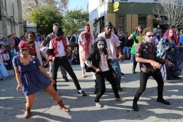 Zombies took over Cotton Street lurching out with eerie dance moves for a chance to win a $100 cash prize (Natavan Werbock/for NewsWorks)