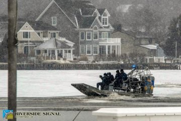 11046528_10153177178907495_8887743193823929013_o Marine crews search the frozen Toms River on March 1 after submerged pickup truck was discovered. (Image courtesy of Riverside Signal)