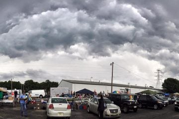 11722553_10100264629572825_3277670594470995858_o-1 A storm front moving over the Collingwood Auction & Flea Market this morning. (Photo: JSHN contributor Corinne Cavallo)