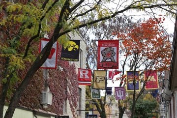  Where in Pennsylvania are these flags hung — bonus points if you can name the walkway.  (Lindsay Lazarski/WHYY) 
