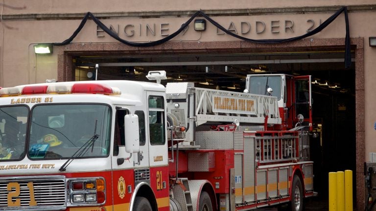  Black ribbons hang over the garage door of the Fire station in Mt Airy. (Bas Slabbers/for NewsWorks) 