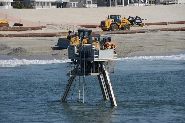 A Coastal Research Amphibious Buggy (CRAB) surveys the surf area of Brant Beach