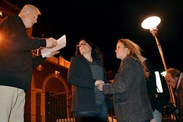  In Asbury Park early Monday, Tom Pivinski (left) officiated the marriage of Heather Jensen (center) and Amy Quinn (right). (Photo courtesy asburyparksun.com) 