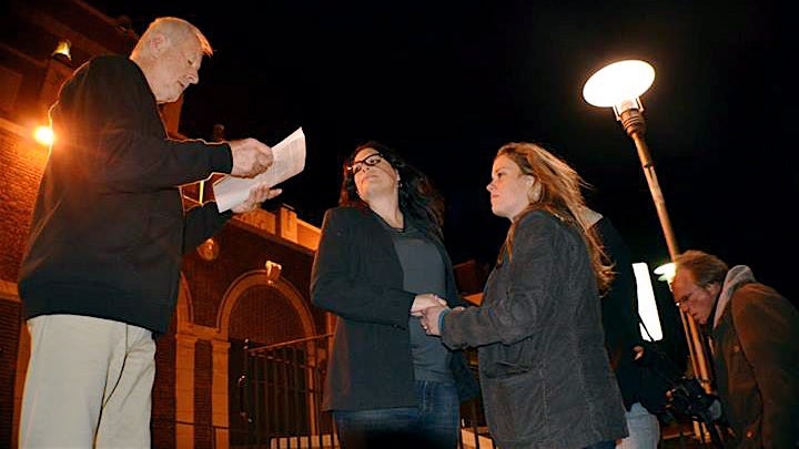  In Asbury Park early Monday, Tom Pivinski (left) officiated the marriage of Heather Jensen (center) and Amy Quinn (right). (Photo courtesy asburyparksun.com) 