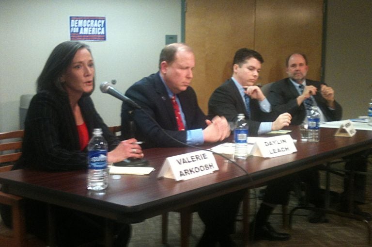  Congressional candidates Valerie Arkoosh, Daylin Leach, and Brendan Boyle join moderator Will Bunch (right) at a forum Sunday. (Newsworks photo/Dave Davies) 