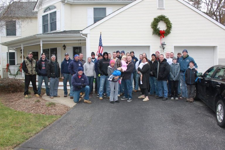  Officers from Toms River and Wall spent Saturday morning cleaning up the exterior of the Zane residence. (Photo courtesy of Wall Police Benevolent Association #234) 