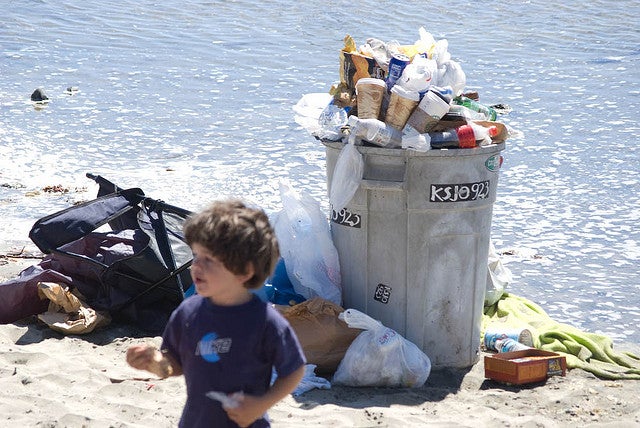  An overflowing garbage can near the water. (Photo: MartinStein via Flickr) 