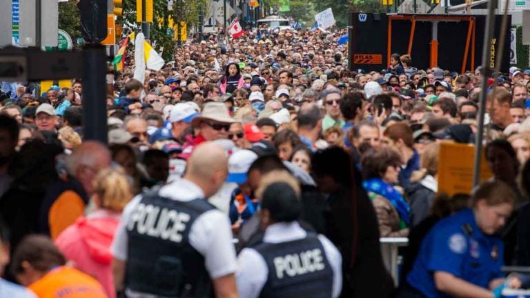  The security checkpoint at 18th and Cherry streets in Philadelphia was overrun on Sunday before Pope Francis' Mass on the Benjamin Franklin Parkway. (Brad Larrison/for NewsWorks) 