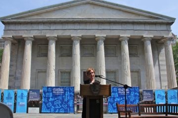 Meryl Levitz, president and CEO of Visit Philadelphia, announces the reopening of the Portrait Gallery at the Second Bank in Old City. (Emma Lee/WHYY)
