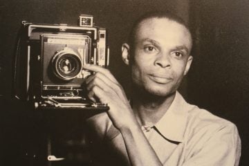 John W. Mosley made this rare self portrait in 1941 with his new Graflex Speed Graphic Anniversary-Edition camera. (John W. Mosley Photograph Collection, Charles L. Blockson Afro-American Collection, Temple University Libraries)