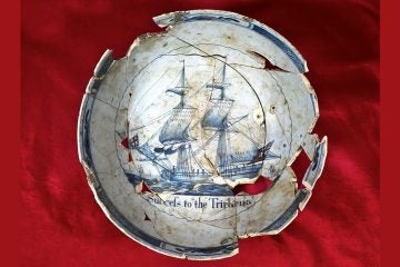 Archaeologists investigating the site of the Museum of the American Revolution found many artifacts, including a punch bowl made out of tin glazed earthenware with the message, ''Success to the Tryphena.'' It was found at the bottom of a privy associated with the Humphreys unlicensed tavern on Carter’s Alley.  (Commonwealth Heritage Group, Inc.)
