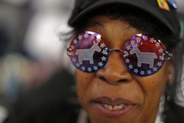 Vivian Stowall of Denver shows off her DNC themed glasses at the 2012 Democratic National Convention in Charlotte