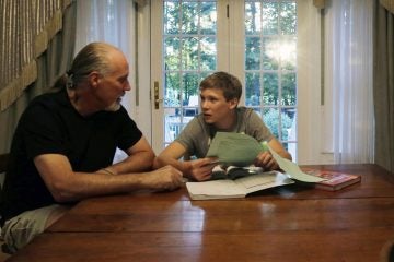 Will Richardson (left) and his son Tucker at their home in Flemington, N.J. Tucker's parents, Wendy and Will, are part of a small but growing number of parents nationwide who are ensuring their children do not participate in standardized testing.  (AP Photo/Mel Evans) 