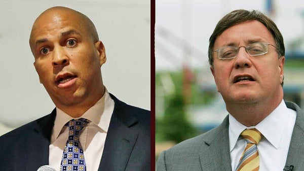  Cory Booker and Steve Lonegan debate Friday in Trenton. (Photos from AP) 