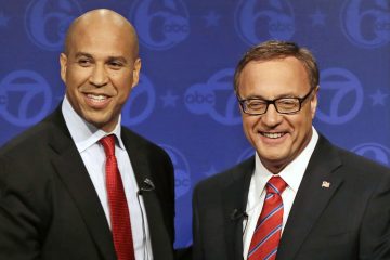 The final U.S. Senate debate between Cory Booker (left) and Steve Lonegan is tonight at Rowan University. (AP Photo/Mel Evans)