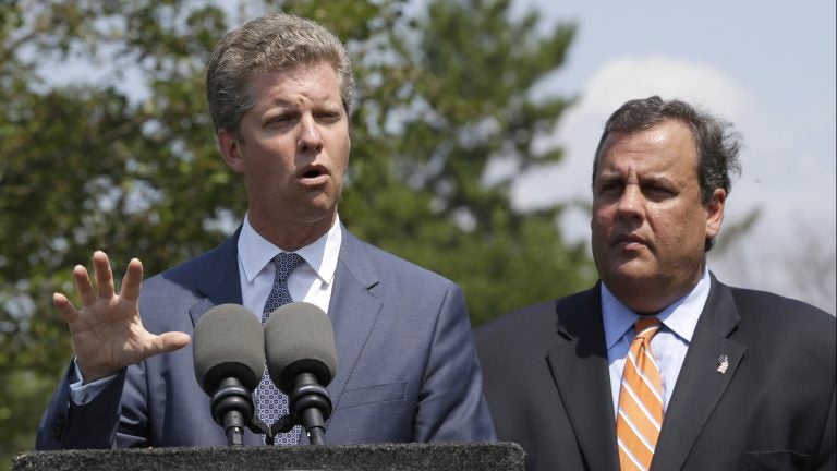  Housing and Urban Development Secretary Shaun Donovan, left, appeared with Gov. Christie on Aug 20, 2013 to promote a post-Sandy rebuilding plan.  (AP Photo/Julio Cortez) 