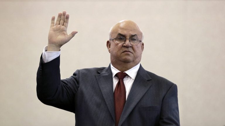  New Jersey State Superior Court Assignment Judge Faustino Fernandez-Vina, of Camden County, is sworn in to testify as the state Senate's Judiciary Committee meets in Trenton, N.J., Thursday, Oct. 17, 2013. (AP Photo/Mel Evans) 