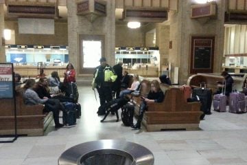  A security dog checks travelers at 30th street station in Philadelphia (Tom MacDonald/for NewsWorks) 