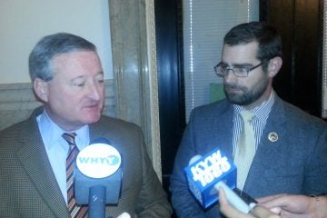 Kenney (L) and Sims (R) talk about bill