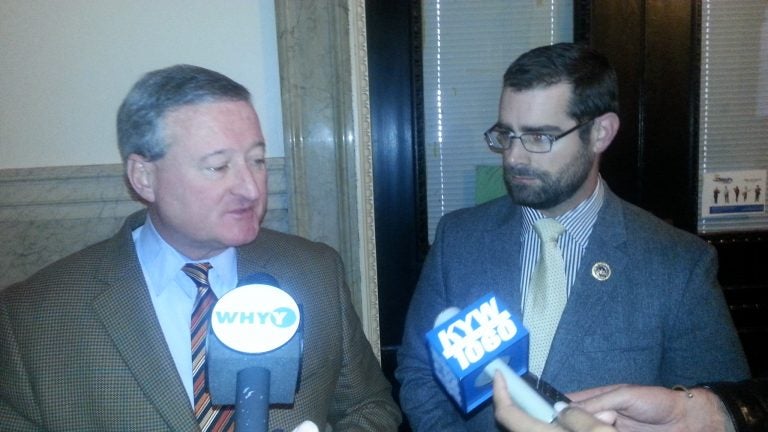 Kenney (L) and Sims (R) talk about bill