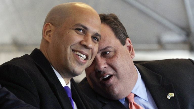  Feb 2012 photo of Newark Mayor Cory Booker with Governor Chris Christie. Booker championed many school reforms unpopular with the unions.  (AP Photo/Mel Evans) 