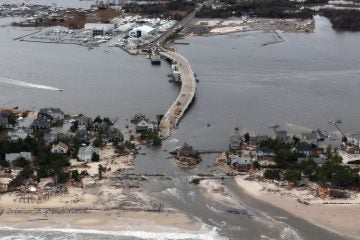 This aerial photo shows storm damage from Sandy in Mantoloking, N.J., Oct. 31, 2012. (Doug Mills, AP Photo, Pool) 