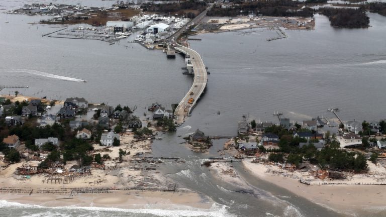 This aerial photo shows storm damage from Sandy in Mantoloking, N.J., Oct. 31, 2012. (Doug Mills, AP Photo, Pool) 