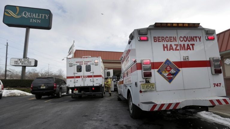  Emergency vehicles are parked outside a Quality Inn in Lyndhurst, N.J. (AP Photo/Charlie Riedel) 