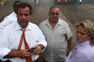  In this Sept. 12, 2013, photo Deputy Chief of Staff Bridget Anne Kelly, right, stands with Gov. Chris Christie, left, during the massive boardwalk fire in Seaside Heights.  (AP Photo/Office of Gov. Chris Christie, Tim Larsen, File) 