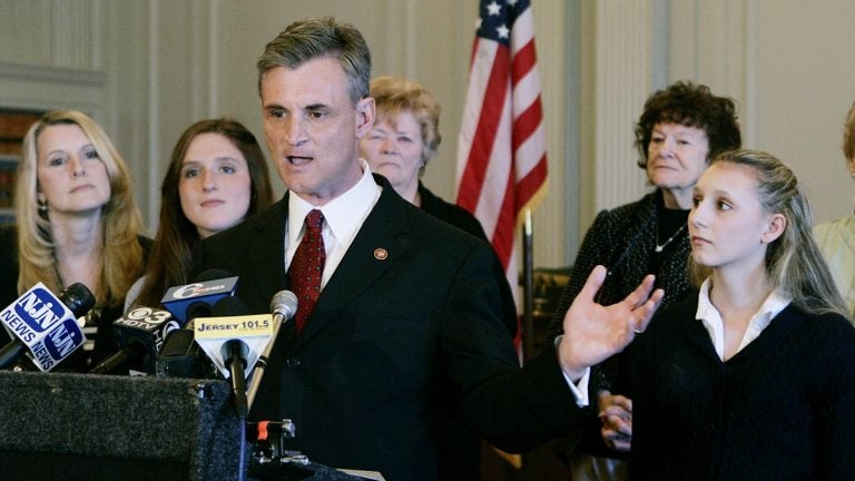  File photo from 2008 of New Jersey Rep. Robert Andrews, D-Camden, with his family, wife Camille Andrews, left, daughters Jacquelyn, second left, and Josie, right. (Mel Evans/AP Photo) 