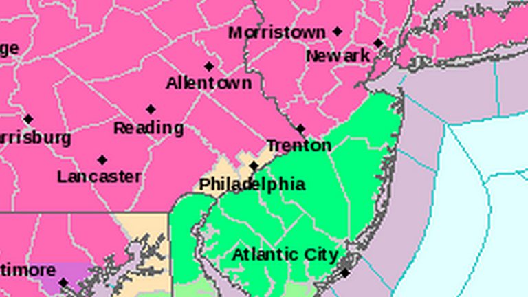  Pink areas are under a Winter Storm Warning. Green areas are under a Flood Advisory. (Image via National Weather Service) 