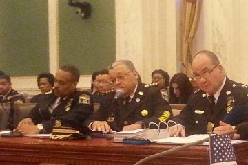  Polie Commissioner Ramsey (Center) flanked by deputies as he talks to City Council (Tom MacDonald/WHYY) 