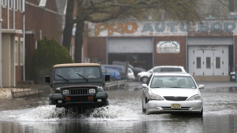  Flooded street in Bogota, N.J. on Thursday, May 1, 2014, (AP Photo/Julio Cortez) 