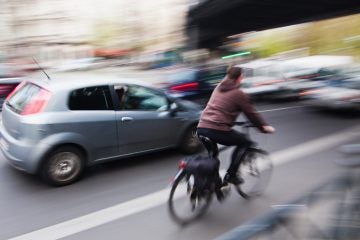 20140518-bike-safety-1200 A bill in the New Jersey legislature would require cars to keep their distance from bikers. (Shutterstock)